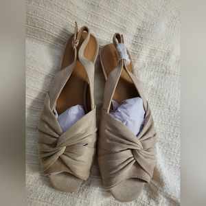 Gorgeous shoes. Material is soft and feels like suede.